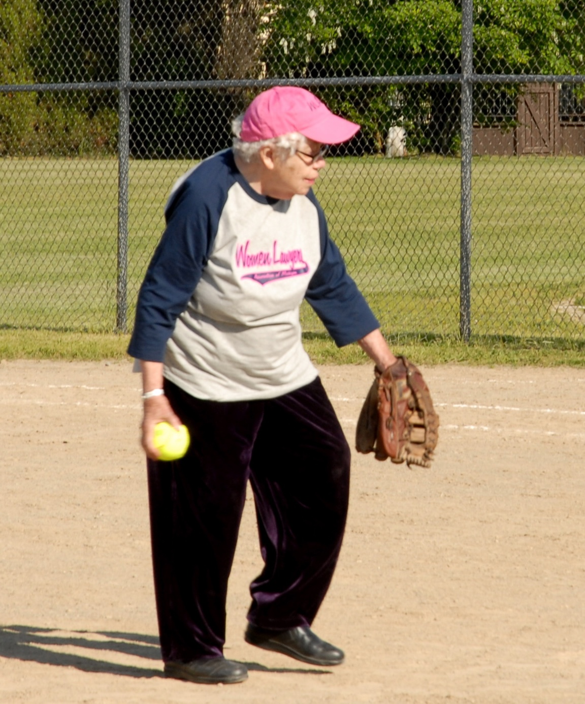 Jean King playing softball. (C) 2006 John Reiser