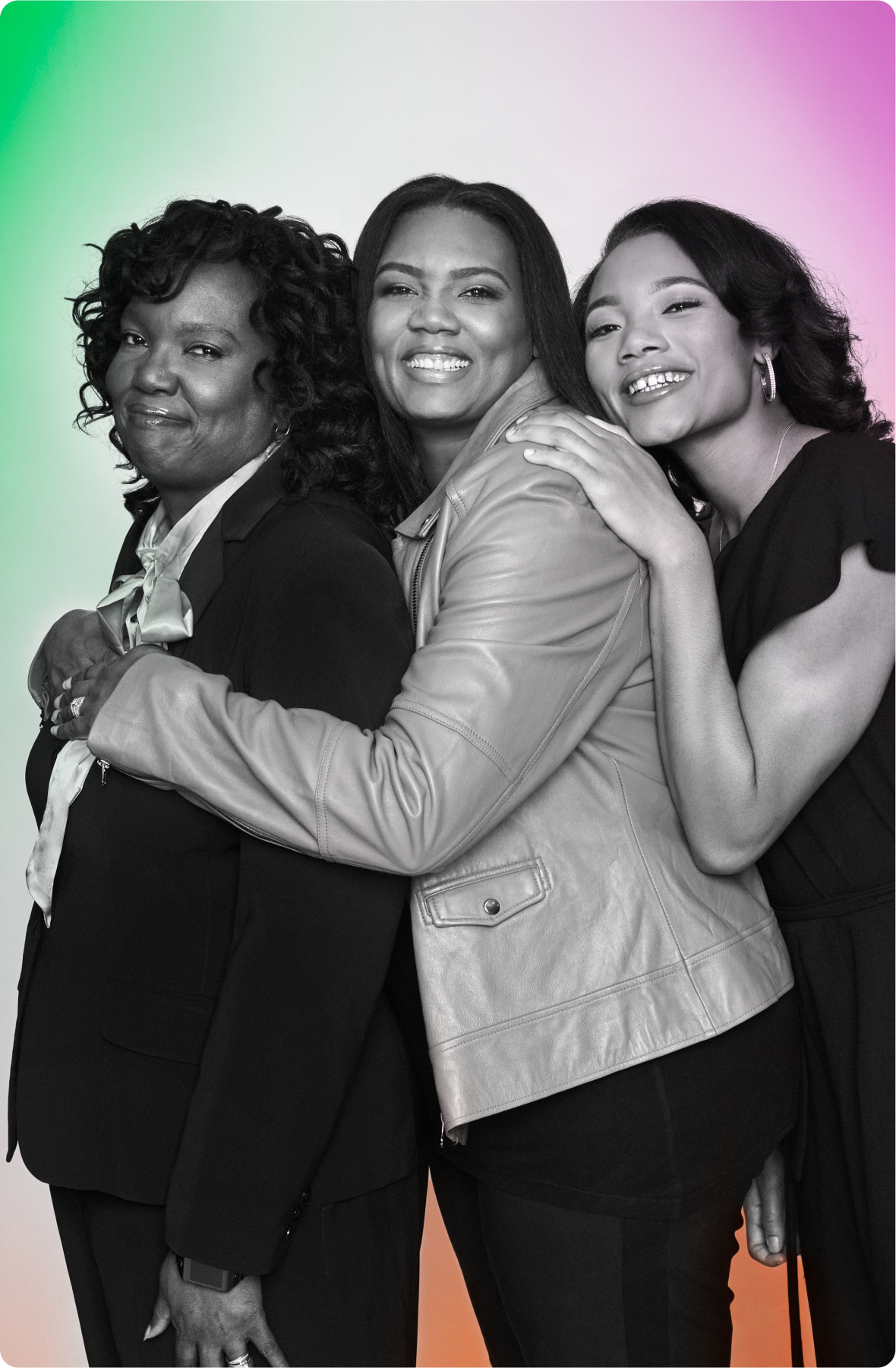 Gail Williams, NaSheema Anderson,and Naz Hillmon hugging each other